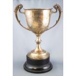 A silver two handled trophy, of chalice form.