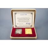 A cased set of royal silver wedding commemorative replica stamps .