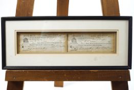 A framed pair of 1840's Advanced payment Navy notes from Bristol, 7cm x 19cm each,