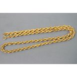 A yellow metal rope link chain, bolt ring clasp, 470mm. Hallmarked 9ct gold, Sheffield, 1982.