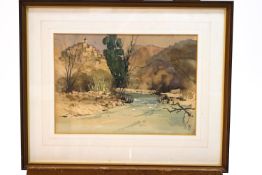 Laurence Irving, Continental landscape, watercolour and bodycolour, signed with monogram lower left,