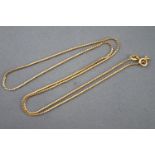 A yellow metal serpentine link chain, bolt ring clasp, 500mm. Stamped 750 for 18ct gold.