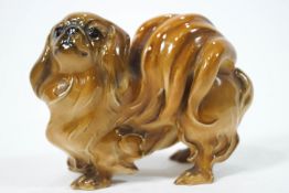A Hutchenreuther dog, modelled in the form of a Pekingese,