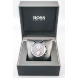 A blue stainless steel Hugo Boss wristwatch. Quartz movement.