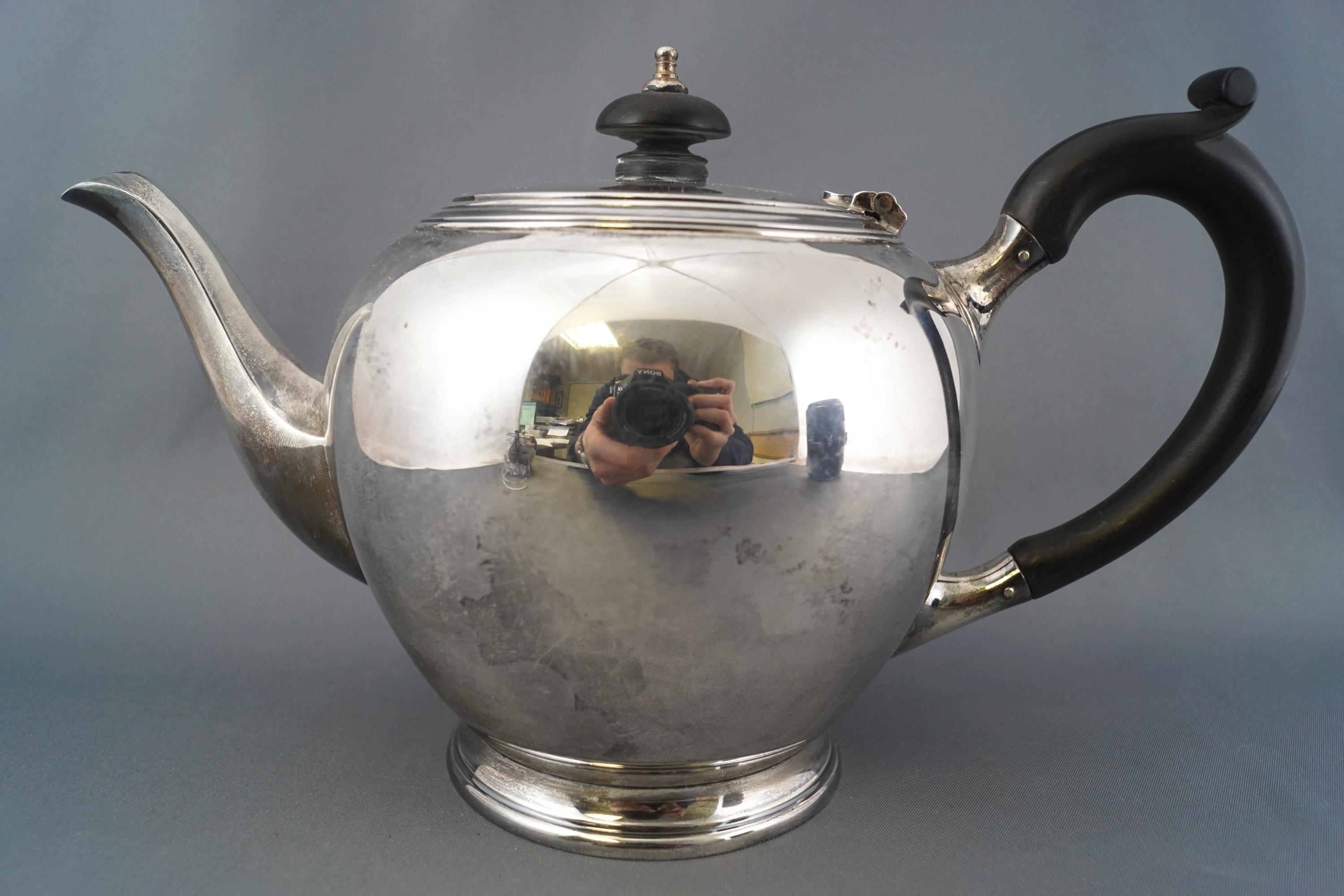 A silver three piece tea service of plain rounded form, with reeded tops and bases, - Image 3 of 5