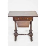 A Victorian rosewood work table, with fitted frieze drawer above the wool box,