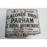 An enamel sign, "To Be Let or Sold Lalonde Bros. & Parham, 7 Royal Promenade Clifton...