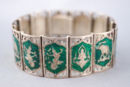 A collection of two white metal panel link bracelets each of Thai origin.