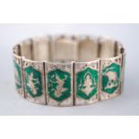 A collection of two white metal panel link bracelets each of Thai origin.