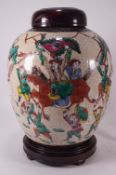 A Chinese crackle glaze ginger jar with polychrome enamel decorated battle scenes,