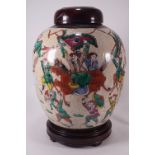 A Chinese crackle glaze ginger jar with polychrome enamel decorated battle scenes,