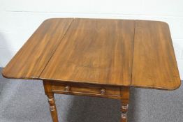 A 19th century mahogany Pembroke table with one frieze drawer on turned tapering legs,