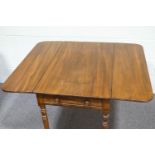 A 19th century mahogany Pembroke table with one frieze drawer on turned tapering legs,