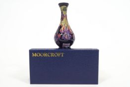 A Moorcroft collectors vase in the fuchsia pattern,