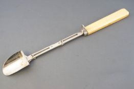 A silver stilton scoop, of usual form,
