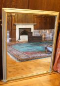 A 19th century over-mantel mirror with gold painted frame,