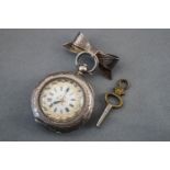 A silver (0.935) open face pocket watch with white ceramic dial.