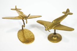 Two brass spitfire style paperweights,