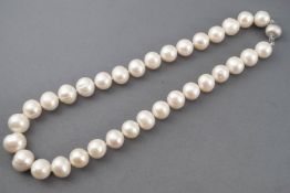 A single strand of thirty three graduated cultured freshwater pearls (untested)