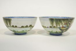 Two Chinese eggshell porcelain bowls with blue enamel decoration and landscape scene to exterior