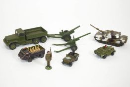 A group of Corgi, Dinky and other cast metal toys, all Army, to include a flatbed truck,