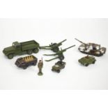 A group of Corgi, Dinky and other cast metal toys, all Army, to include a flatbed truck,