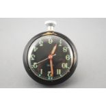 A black cased open face magnetic dashboard pocket watch by Smiths.