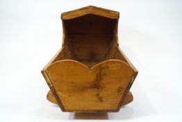 A 19th century style pine cradle,