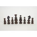 A turned hardwood chess set,