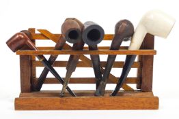A gate style pipe rack together with a collection of pipes