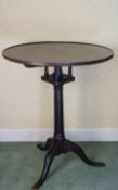 A 19th century mahogany tilt top table with bird cage above turned pedestal on cabriole legs,
