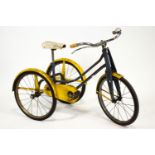 A "Silver" tricycle, in blue and yellow livery,