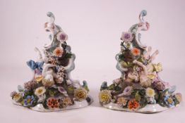 A pair of 19th century Dresden porcelain wall brackets,