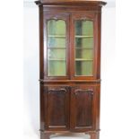 A Victorian mahogany standing corner cabinet,