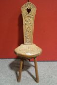 A Welsh oak chair with carved pierced back,