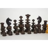 A turned hardwood chess set,