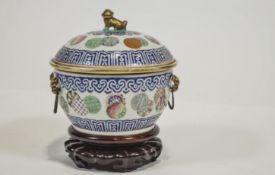 A Chinese bowl, cover and liner, the cover with a Dog of Fo style knop,