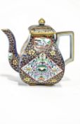 A 19th century pottery teapot of squared baluster form and chinoiserie decoration