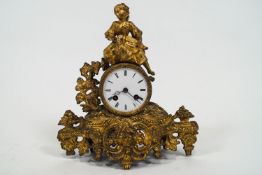 A cast gilt metal French clock,