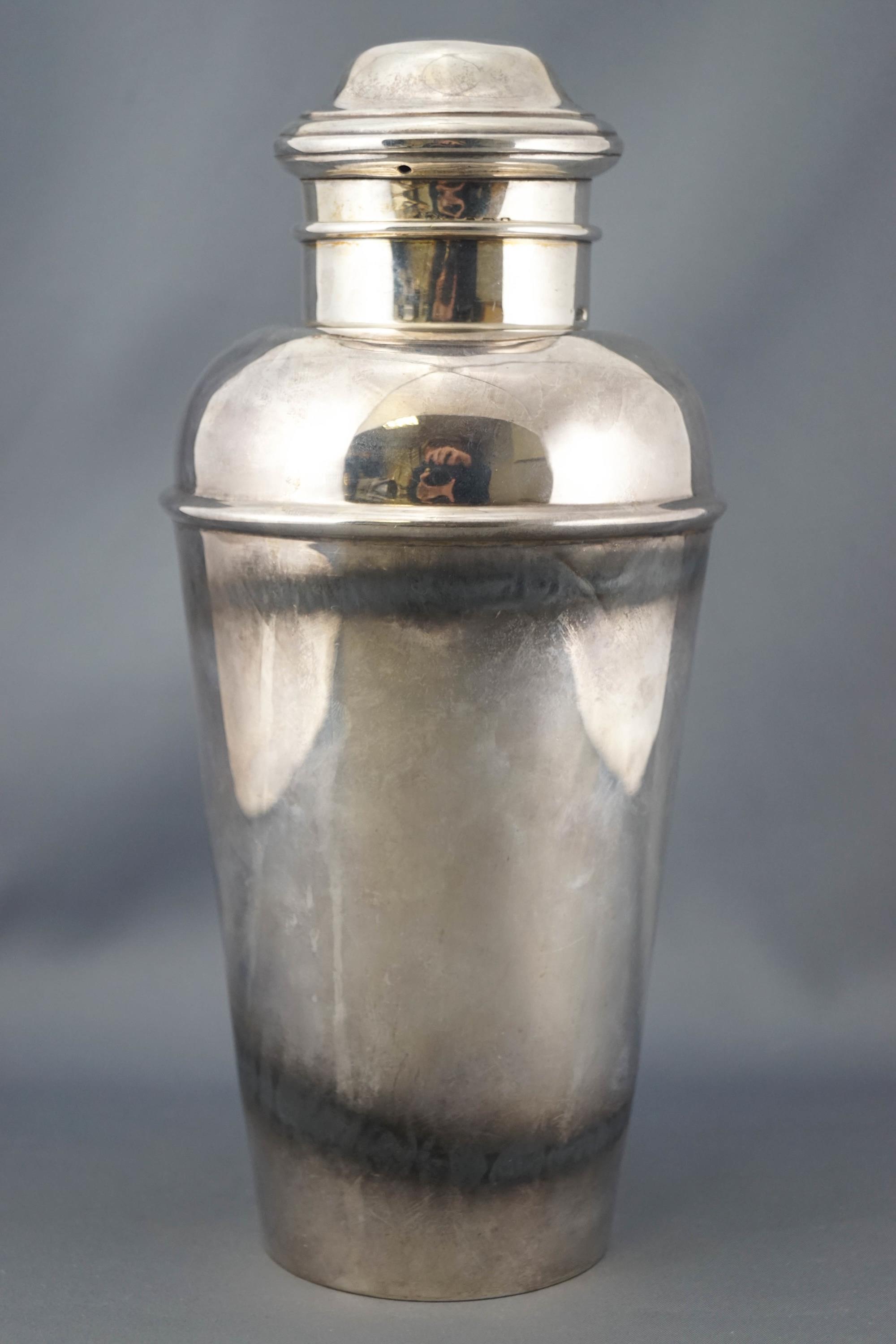 An Art Deco style silver cocktail shaker,