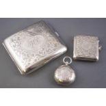 A silver shaped cigarette case, with engraved scrolling foliage decoration, Chester 1916,