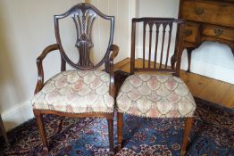 A 19th century mahogany elbow chair with shield shaped backs,