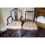 A 19th century mahogany elbow chair with shield shaped backs,