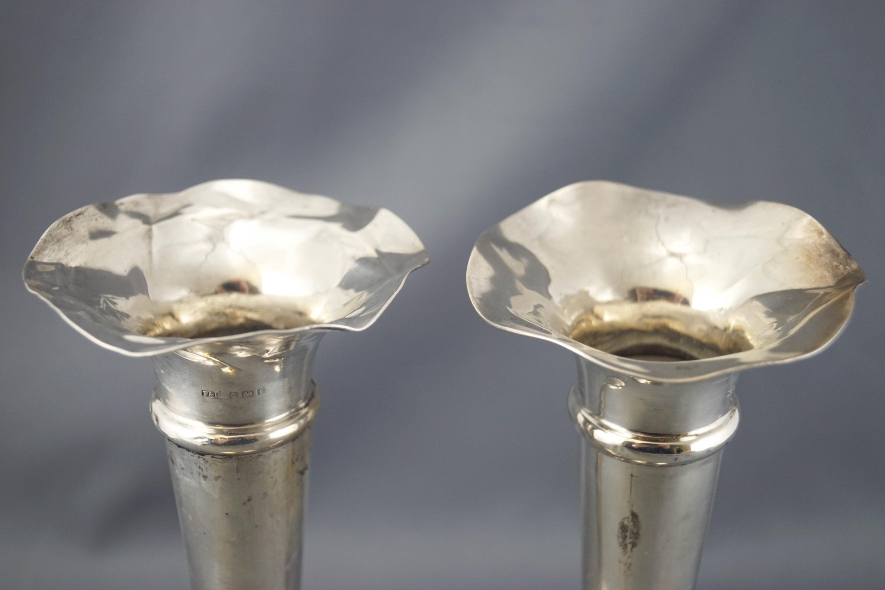 A pair of loaded silver trumpet form spill vases, with petal form rims, Birmingham 1905, - Image 2 of 2