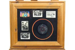 A Beatles memorabilia framed group,