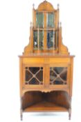A Victorian mahogany standing corner cabinet,