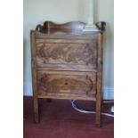 A George III mahogany tray top commode with two hinged doors,