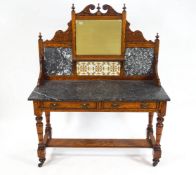 A 19th century pitch pine wash stand with decorative shaped back with broken pediment above a