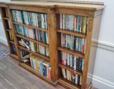 A Victorian walnut breakfront bookcase with gilt metal mounts,