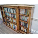 A Victorian walnut breakfront bookcase with gilt metal mounts,